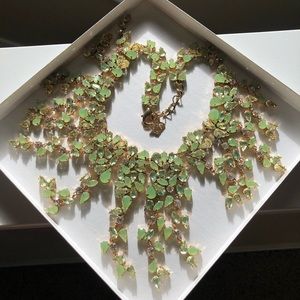 BCBGMaxAzria Gold and Green drop leaf necklace.